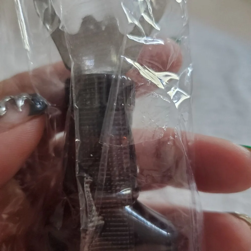 This that dark Jack Daniel 5 inch Bottle opener Magnet